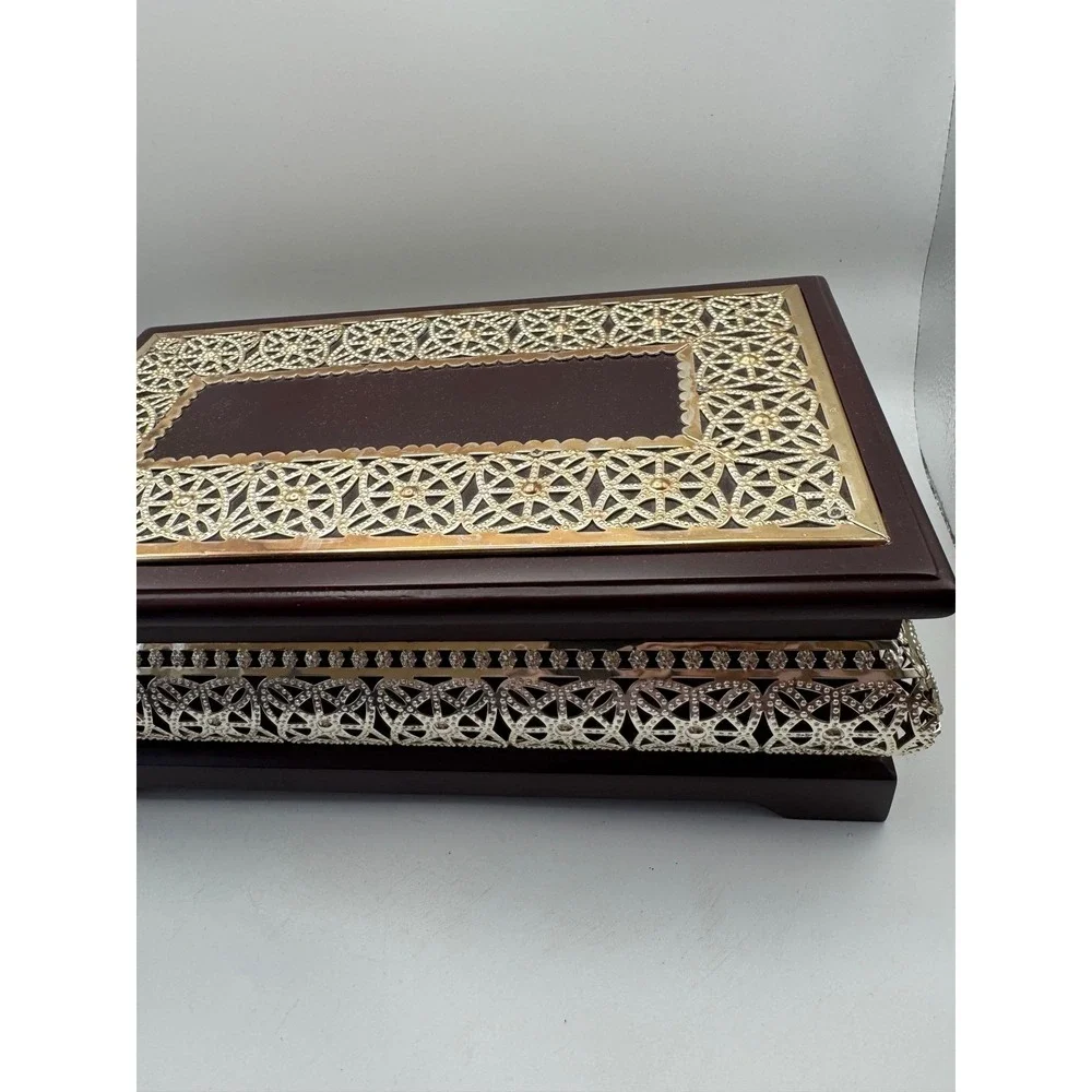Elegant Wooden Jewelry Box with Ornate Metal Accents and Mirror